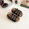 Black children's Birkenstock style sandals with adjustable gold buckles and cork soles - Size 21 (13.5cm) / Black