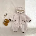 Close-up of baby winter romper with fuzzy bear ears hood and plush fleece texture - 66cm / Mocha