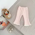 Detail of pink flared toddler trousers with lace trim hem and soft textured fabric - Pink / 73cm