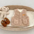 Detail of warm lamb wool baby vest with bear embroidery and matching booties in a basket - Tops / Bear Style / 73cm
