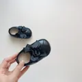 Zwarte lakschoenen voor babymeisjes met strik en zachte voering voor de winter - S (Binnenlengte 11cm) / Zwart