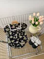 Floral baby bodysuit with lace collar and matching shoes in a vintage shopping basket - Small Black Floral / 66cm