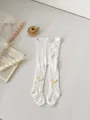 White knit mesh baby tights with pink bows and hollow lace pattern for toddlers - S (0-1 Years) / White