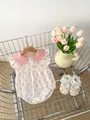 Detail view of floral baby romper with tulip print and matching lace bow shoes in a cart - 66cm / Pink