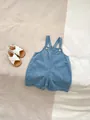 Detail of baby denim overalls with cute bear prints and white polka dot patterns - 66CM / Light Blue