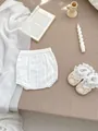 Baby Mädchen weißes Strick-Set mit Shorts und passenden Spitzenschuhen für den Sommer - 66CM / Weiße Shorts