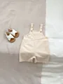 Infant beige cotton linen romper with shoulder straps and white baby sandals set - 73cm