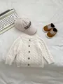 Tutina neonato in maglia beige con motivo a trecce e bottoni in legno naturali - 66cm / Top / Bianco avorio