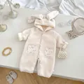 Detail of baby floral bunny ear romper featuring plush lamb wool and cute floral patterns - 66cm / Apricot