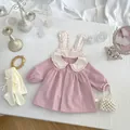 Detail of pink toddler cardigan featuring cute rabbit ear collar and ruffled lace trim - 73cm / Pink Purple