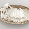 Detailed view of polka dot baby outfit with bead straps and lace-trim infant shoes - 73cm / Off-White Polka Dot