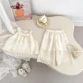Detailed lace trim and polka dot texture on cream summer two-piece girls clothing set - 73 / Apricot