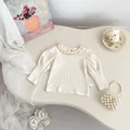 Detail of cream rib-knit baby top with lace collar and puffed sleeves in French retro style - Lace Collar Base Shirt (Beige) / 73cm