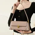 Minimalist leather baguette underarm bag in khaki with a vintage gold buckle - Taro Pink