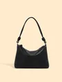 Minimalistische schwarze Leder-Schultertasche mit Knotendetail und weicher Lederstruktur - Schwarz