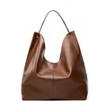 Bolso hobo grande de hombro en cuero de curtido vegetal premium color caramelo oscuro - Marrón