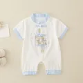Short sleeve baby romper in white with blue piping and traditional floral embroidery - White / 66cm