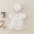 Infant floral summer romper set with lace details and a matching ruffle sun hat - 66cm / Triangle Romper With Hat