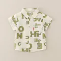 Chemise enfant à manches courtes beige avec imprimé abstrait vert et poche - 90 / Vert