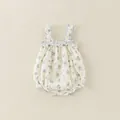 Floral baby romper with ruffled straps and blue flower pattern on off-white cotton fabric - 66cm / Blue