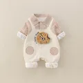 Baby boy knit romper with check patterns and a 3D cookie decoration in cream white - Brown / 66