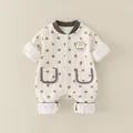 Babyboxpakje van katoen in crème met bruine stippen en een giraf-decoratie - Abrikoos / 66CM