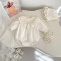 Detail of baby romper with elegant lace ruffles, hollow embroidery and matching bonnet - 66 / Apricot