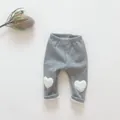 Close-up of grey baby leggings with heart knee patches and warm fleece lining - 66 / Gray