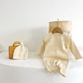 Newborn ribbed cotton romper set with ruffles and matching knotted hat in cream white - 73cm / Apricot
