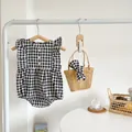 Pagliaccetto neonato in cotone senza maniche con motivo a scacchi bianco e nero - 66cm / Nero