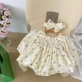 Floral baby girl romper with ruffle collar detail and matching bow headband on a hanger - 66cm / Apricot Floral