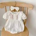 White cotton baby romper with floral embroidery and matching bow headband - 66cm / White