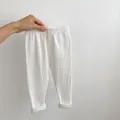Infant ribbed cotton leggings in white featuring elastic high waist and folded cuffs - White