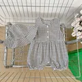 Baby sleeveless gingham romper and matching sun hat set in classic black and white pattern - Plaid / 66cm