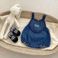 Infant denim romper in dark blue with heart embroidery and canvas shoes in a basket - 66cm / Dark Blue