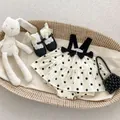 Baby girl white polka dot romper dress with black bows and matching princess shoes - 66 / Off-White Polka Dot