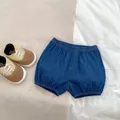 Infant navy denim bloomers paired with brown patchwork walker shoes for 12-18 months - Blue