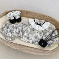 Completo neonata con top floreale a maniche lunghe pantaloncini e calze di pizzo - 66 / Floreale Nero