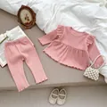 Pink knit two-piece toddler set with ruffled sleeves and elastic waist trousers - 73cm / Pink