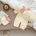 Cream ribbed knit long sleeve baby bodysuit with pink bow collar and matching frill hat - 66cm / Milk Apricot