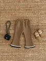 Detail of girls flared corduroy trousers with elastic waist and wavy hem decoration - 66 / Light Brown