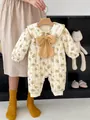 Quilted floral baby romper with large bow and Peter Pan collar for winter warmth - Yellow Floral / 66cm