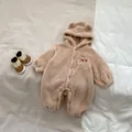 Close-up of soft beige fleece baby romper with cute bear ear hood and embroidery - 80cm / Bear (Light Brown)