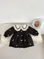 Toddler girl winter cotton jacket in black with white ruffle collar and bow pattern - Black / 66cm