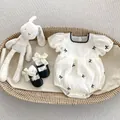 Detail of baby girl bodysuit with bubble sleeves, bow embroidery and matching shoes - Baby Romper / 66cm