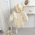 Detail of sweet floral tulle baby romper dress with matching knitted beret and shoes - 66cm / Jumpsuits / Apricot