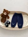 Dark blue waffle knit baby trousers with bear embroidery and cuffed leg openings - 120cm / Blue Bear