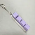 Stress relief fidget keychain with 4 keys in purple transparent finish on white base - 4-Key White Shell Purple