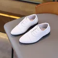 Classic boys' white formal oxford dress shoes with black soles for weddings and events - EU 26 / White