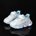 Light-blue girls' LED light-up sneakers with snowflake pattern and shiny reflective details - Size 21 / Blue